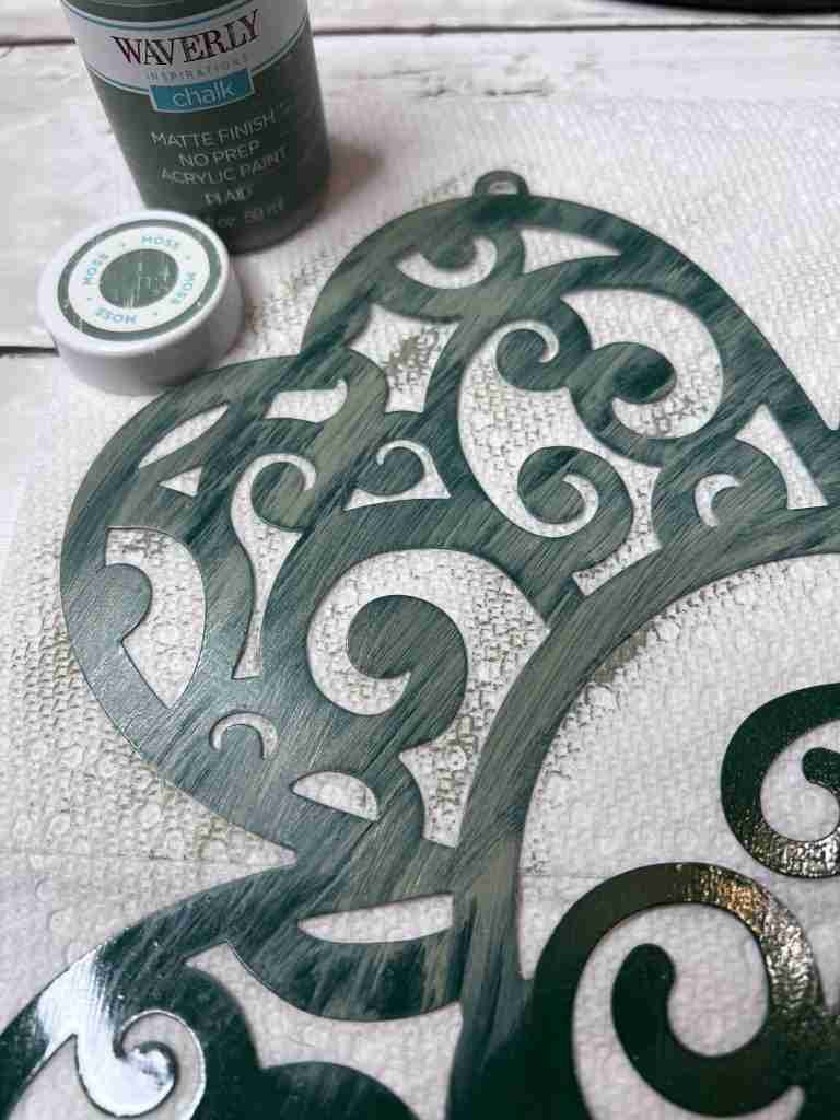 Dollar Tree metal shamrock spray painted green with Moss green paint applied on top