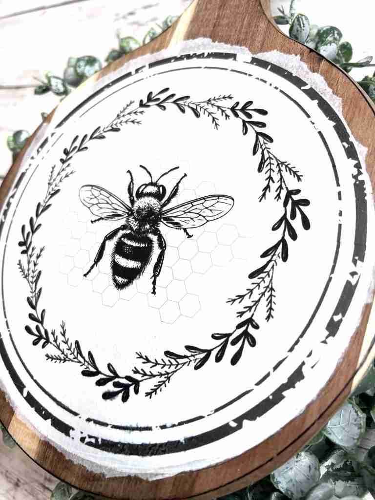 honey bee printable decoupaged onto cutting board