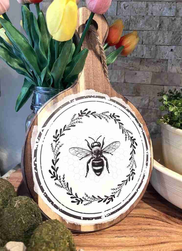 honey bee printable decoupaged onto cutting board