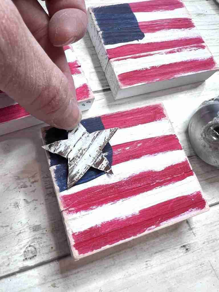 blocks painted to look like flags with cardboard star added