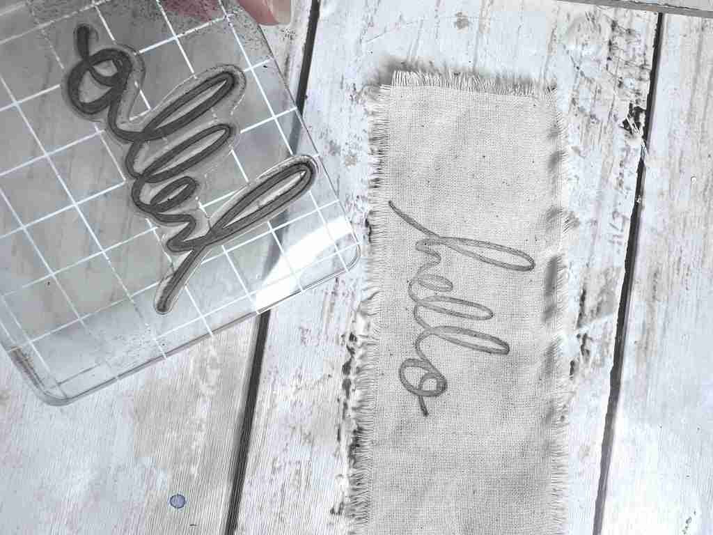 hello stamped onto material
