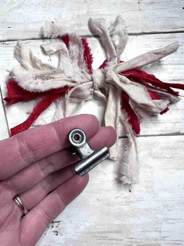 rag bow and metal clip