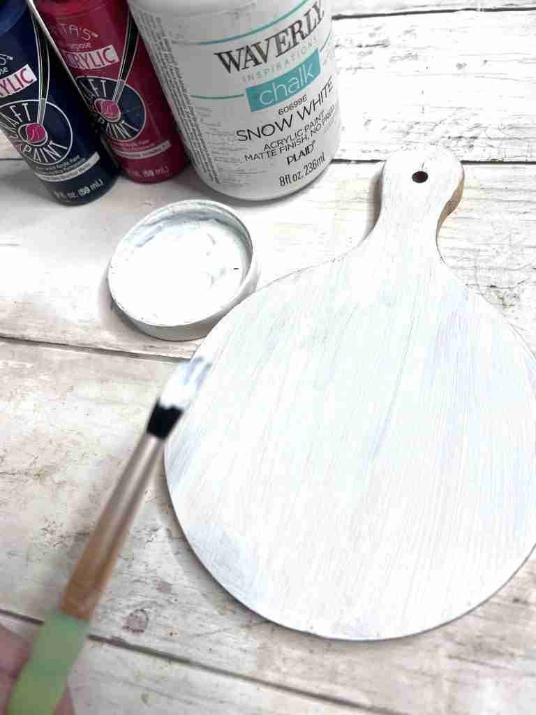 Hobby Lobby mini cutting board painted white, red, white, and blue paint