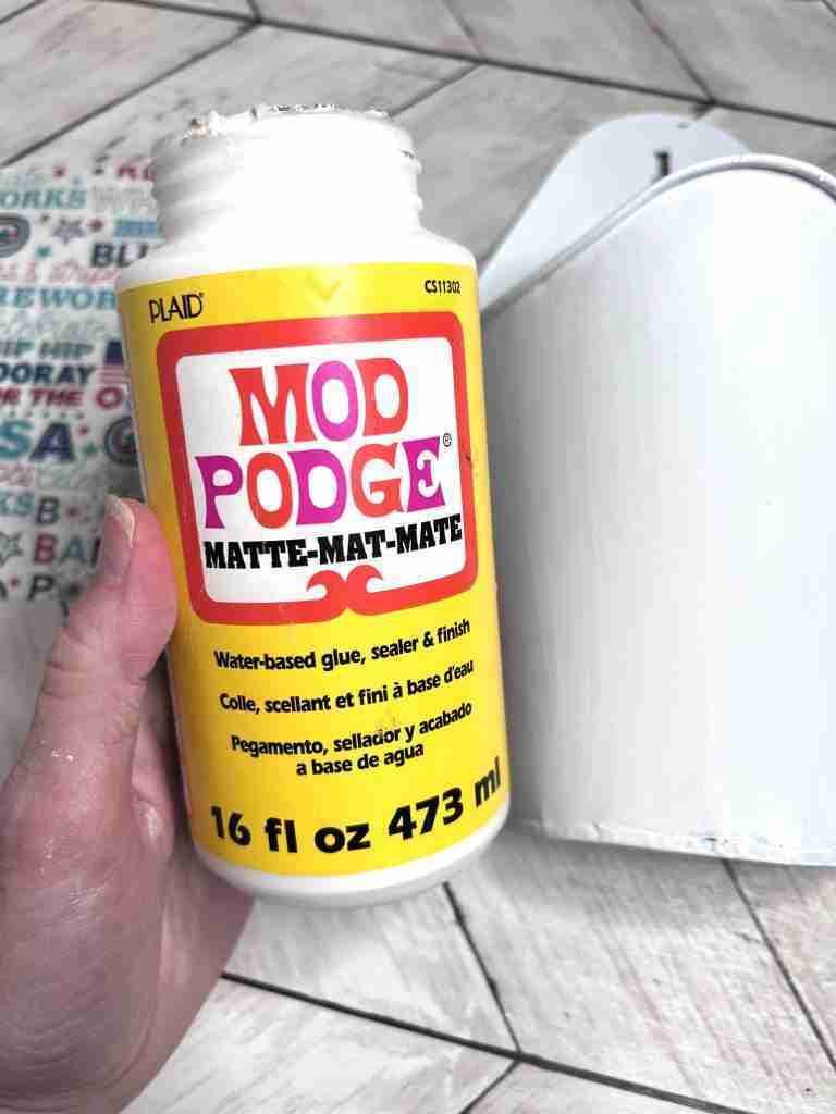 Mod Podge to brush onto container