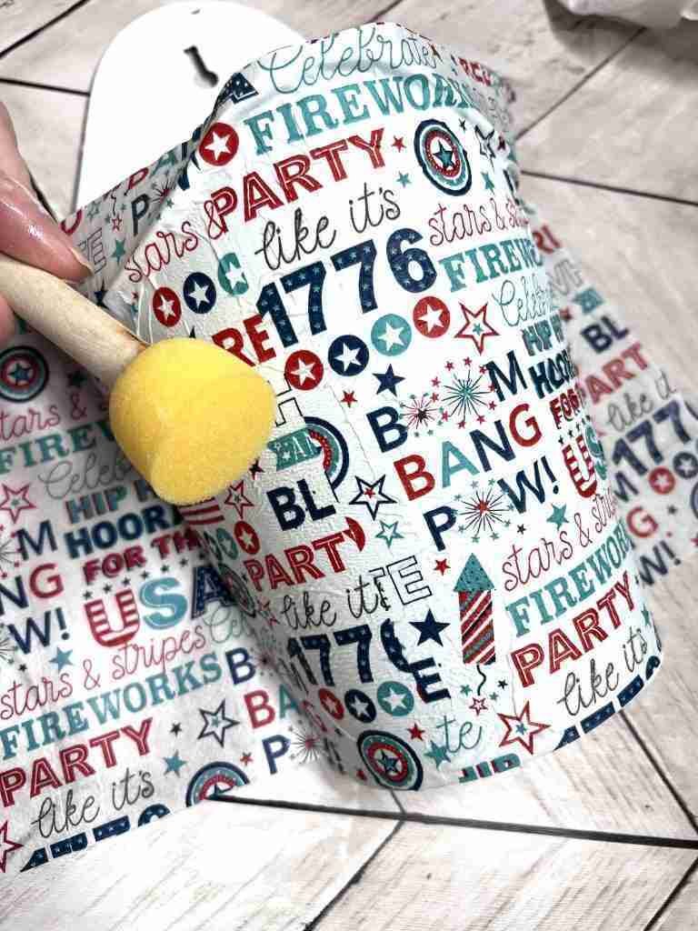 napkin applied to container