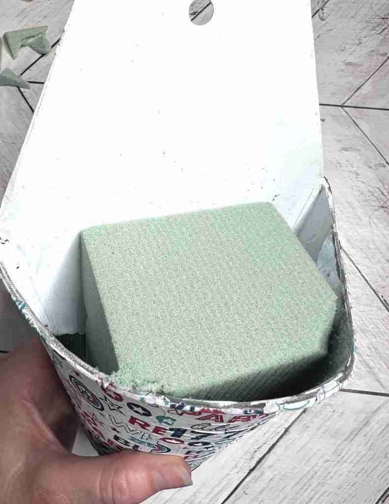 floral foam inserted into container