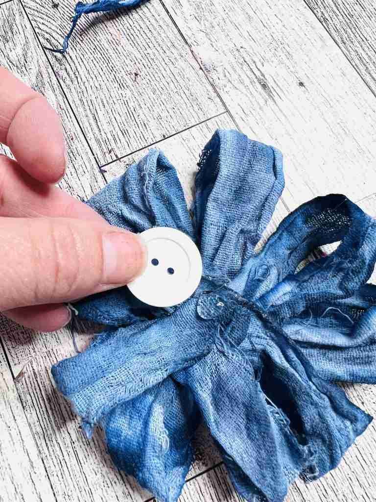 flower made from sections of painted flour sack