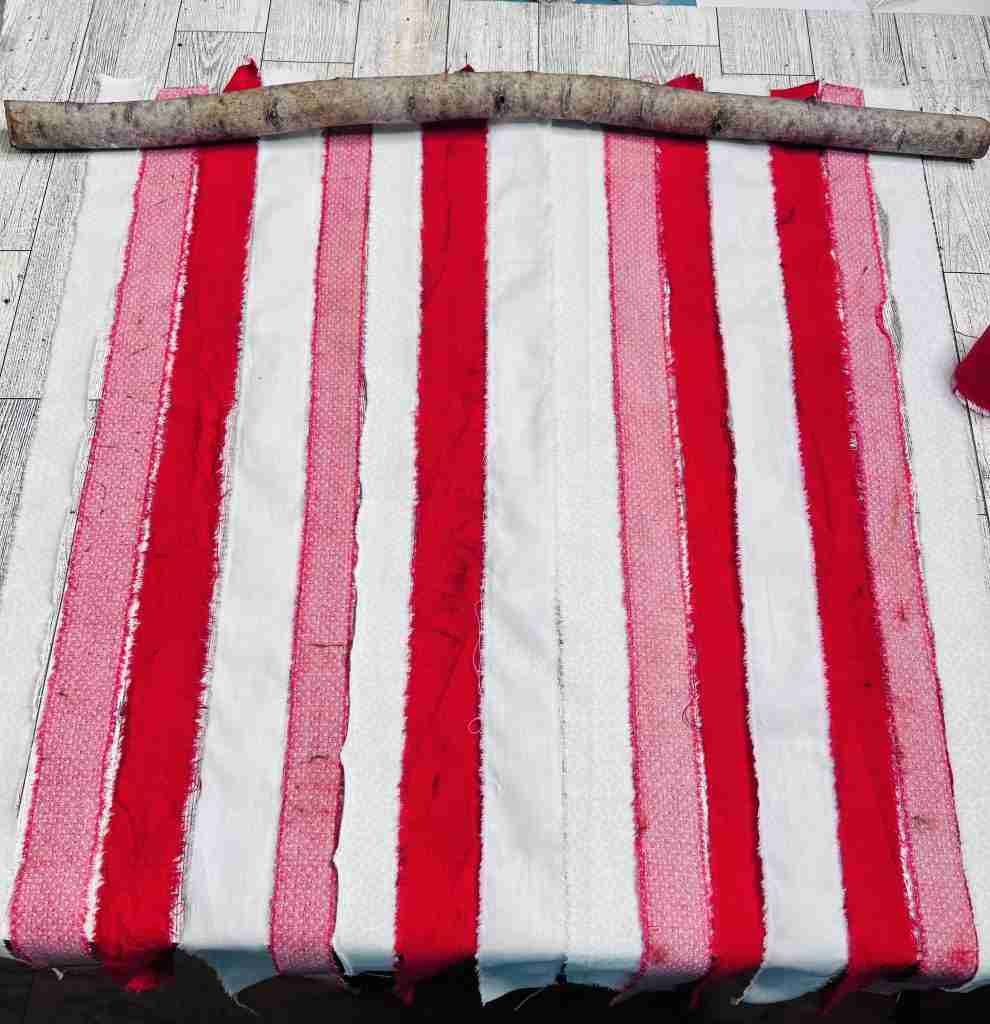 strips of material laid out under stick