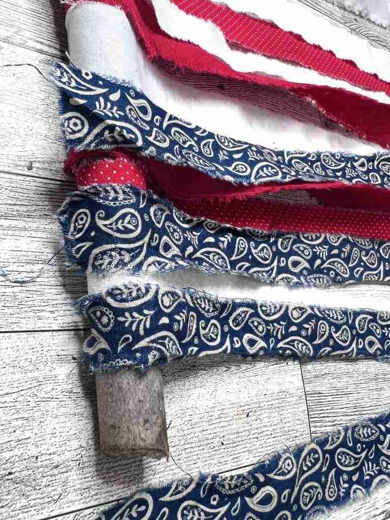 gluing strips of material to stick