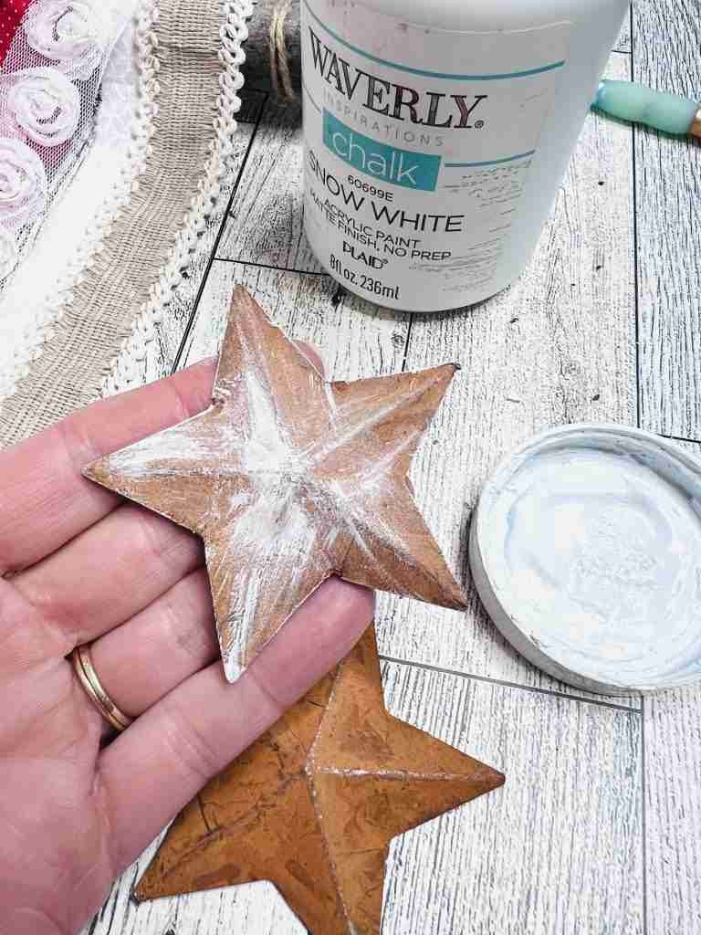 painting rusty star half