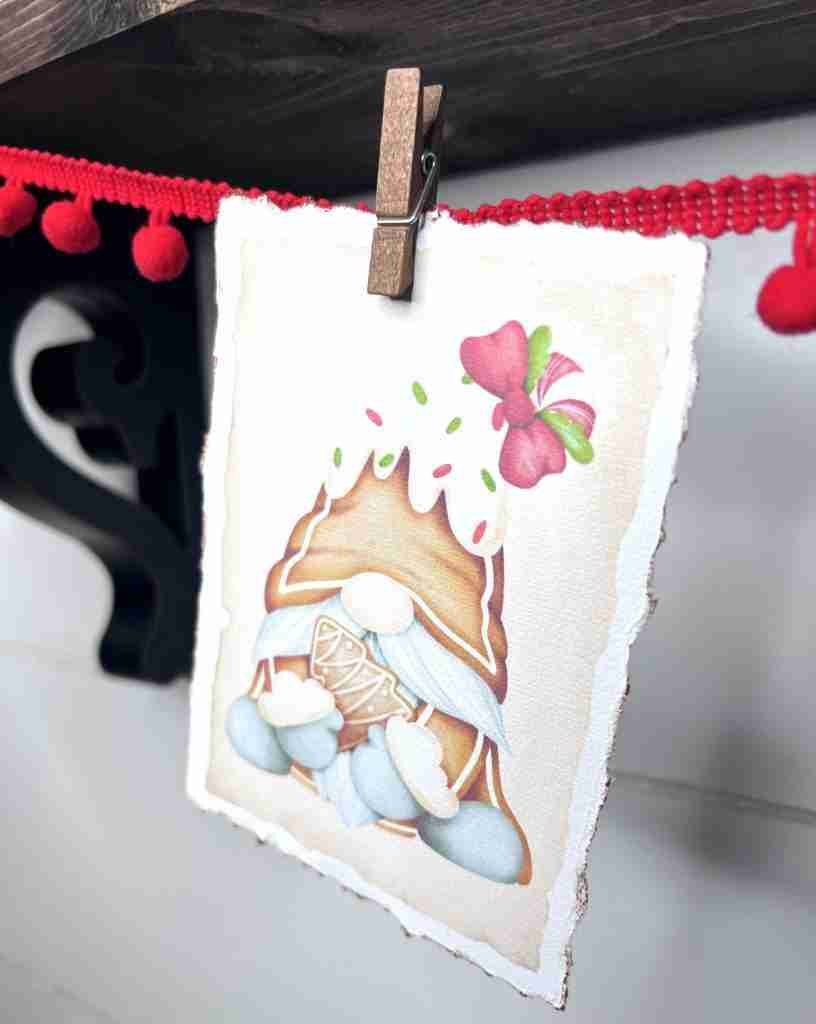 free Christmas gnome printables attached to pom pom garland