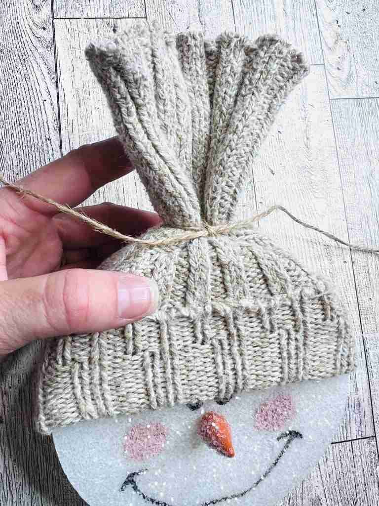 sock added for hat and tied at top