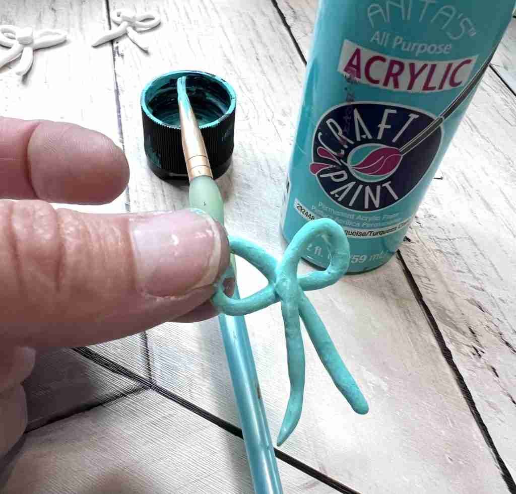 bow painted turquoise 