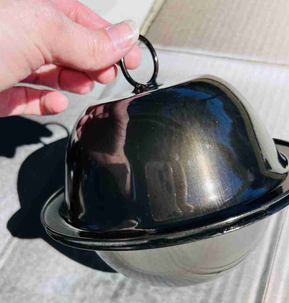 Dollar Tree metal bowls glued together and spray painted black