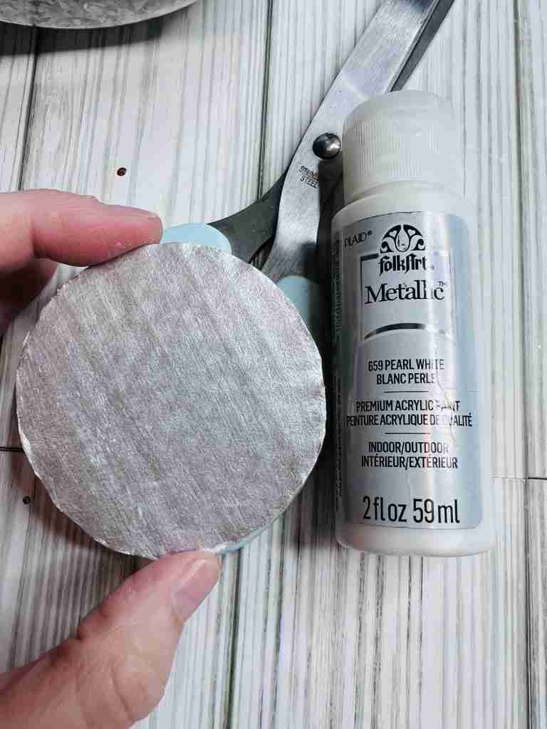 cardboard circle painted pearl white