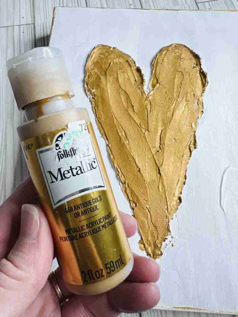 dried compound heart painted gold