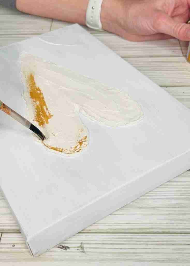 dried compound heart painted gold