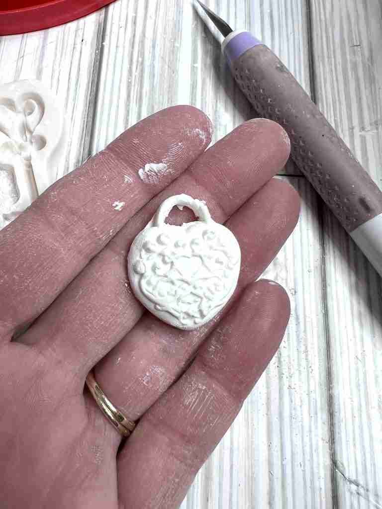 heart locket shaped clay piece