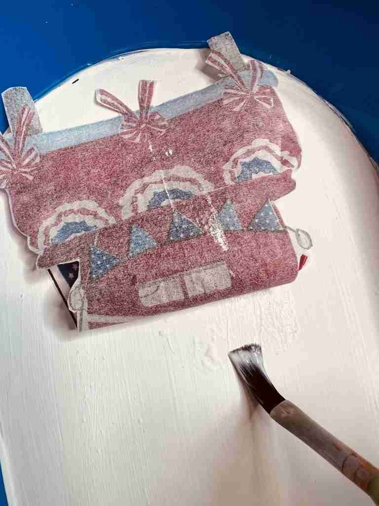 red truck cut from napkin and applied to shovel with Mod Podge