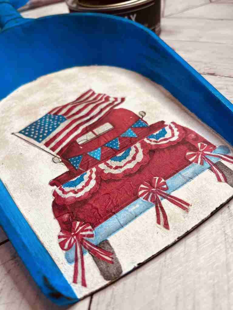 dark Behr wax applied to plastic shovel