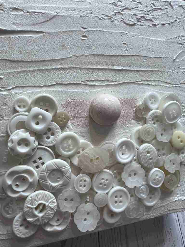 half wood bead added to canvas for Santa's nose