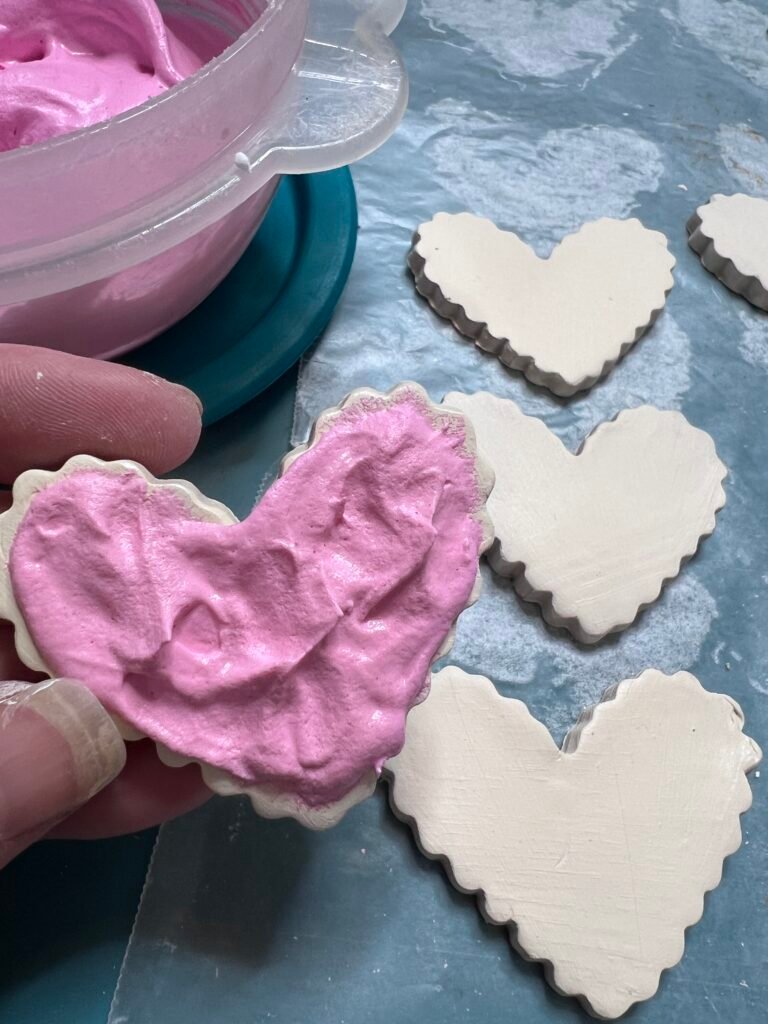faux spackling icing on clay cookies