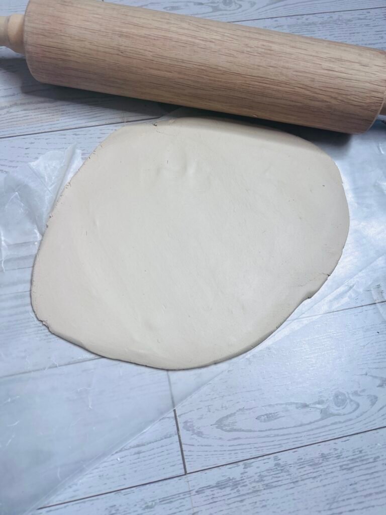 clay rolled out to about 1/4" thickness