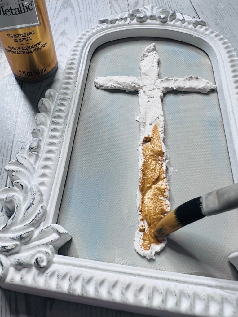 Dry Dex joint compound applied to Walmart Canvas frame with gold paint applied
