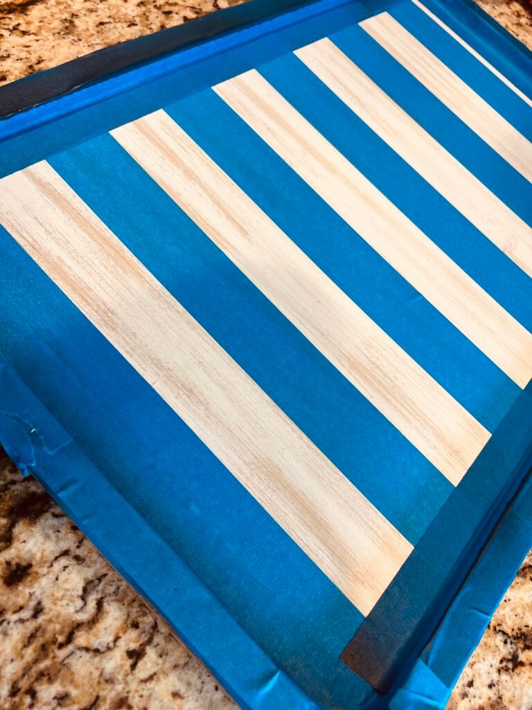 painters tape added to sign for red striped